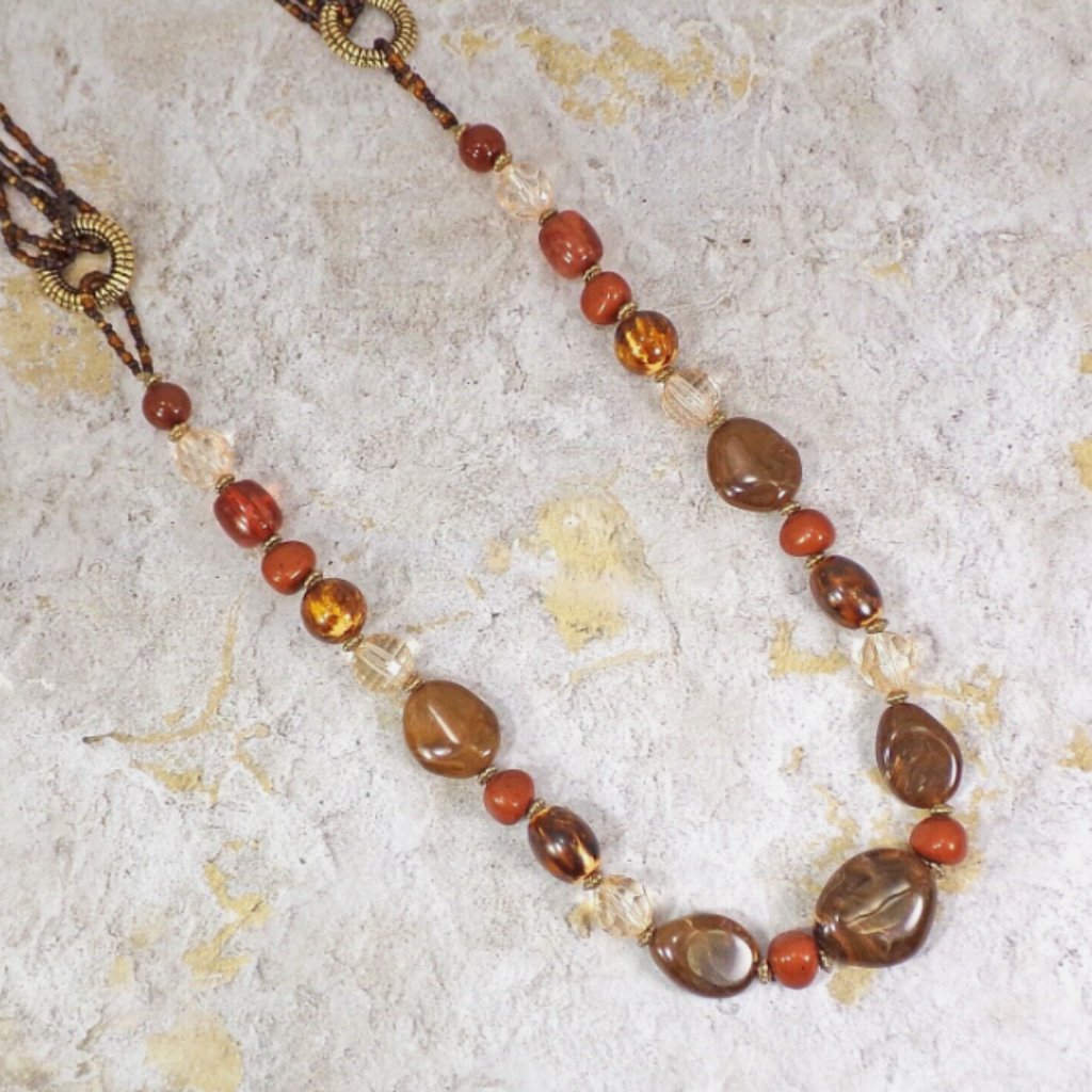 Long Brown Beaded Necklace With Swirl Beads, Brown Seed Beads And Gold Beads